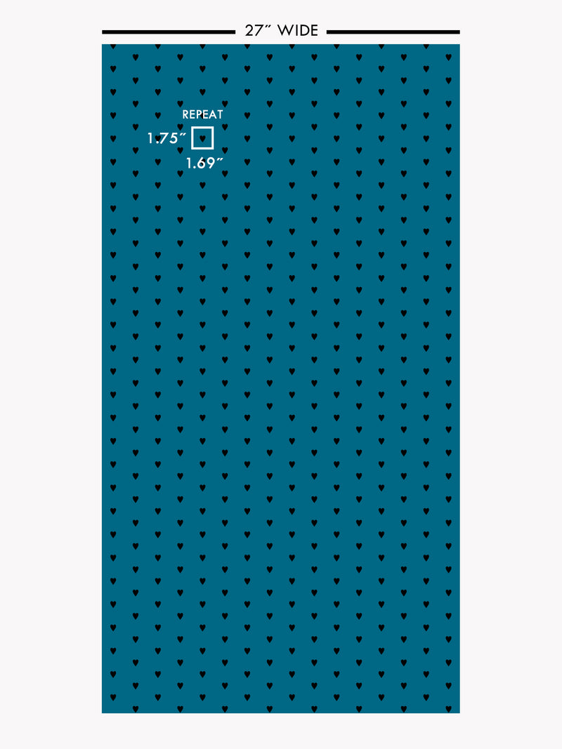 Hand screen printed wallpaper featuring black hearts on a blue background.