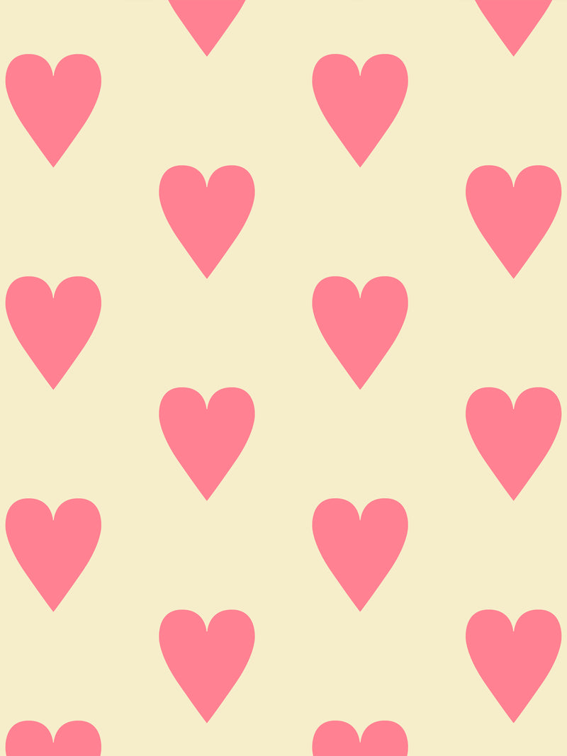Hand screen printed wallpaper featuring pink hearts on a pale yellow background.