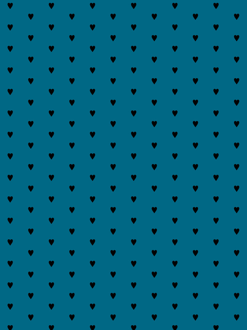 Hand screen printed wallpaper featuring black hearts on a blue background.